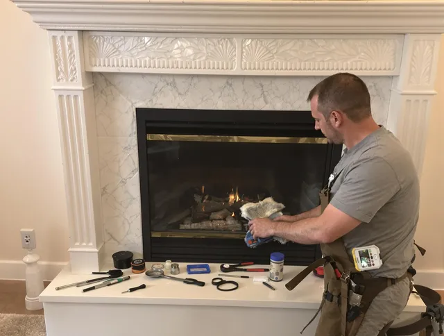 Jacksonville Chimney Sweep performing fireplace maintenance in Jacksonville, FL